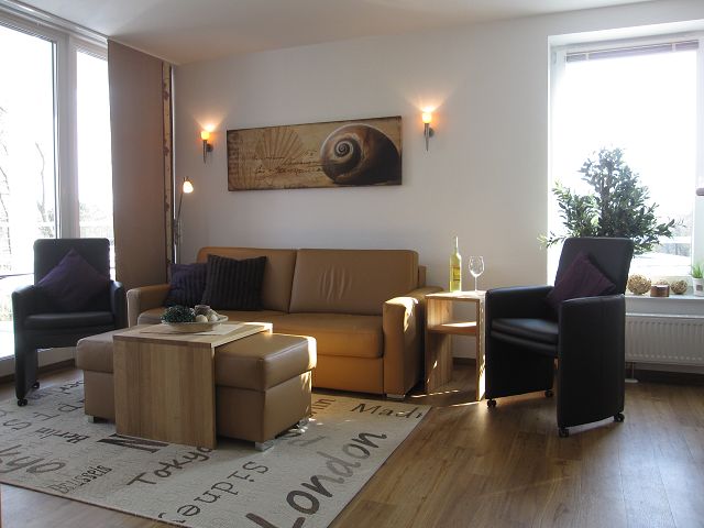 Wohnzimmer mit Schlafsofa